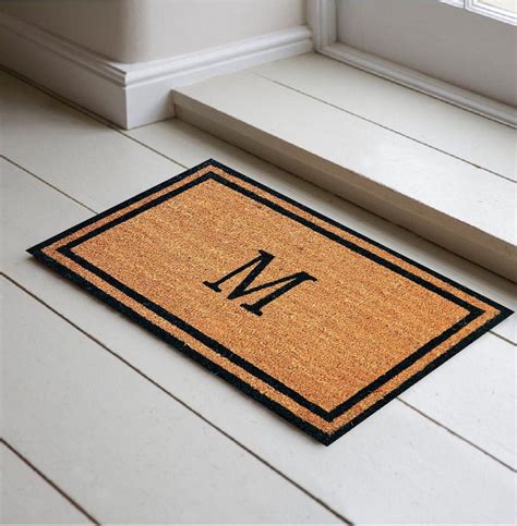 The Chevron IndoorOutdoor Monogram Doormat adds fun charm to your entryway. . Monogram doormat